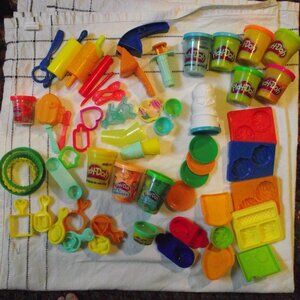 A PACKAGE OF MANY PLAY DOH SETS